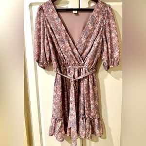 Brand new wrap mini dress.